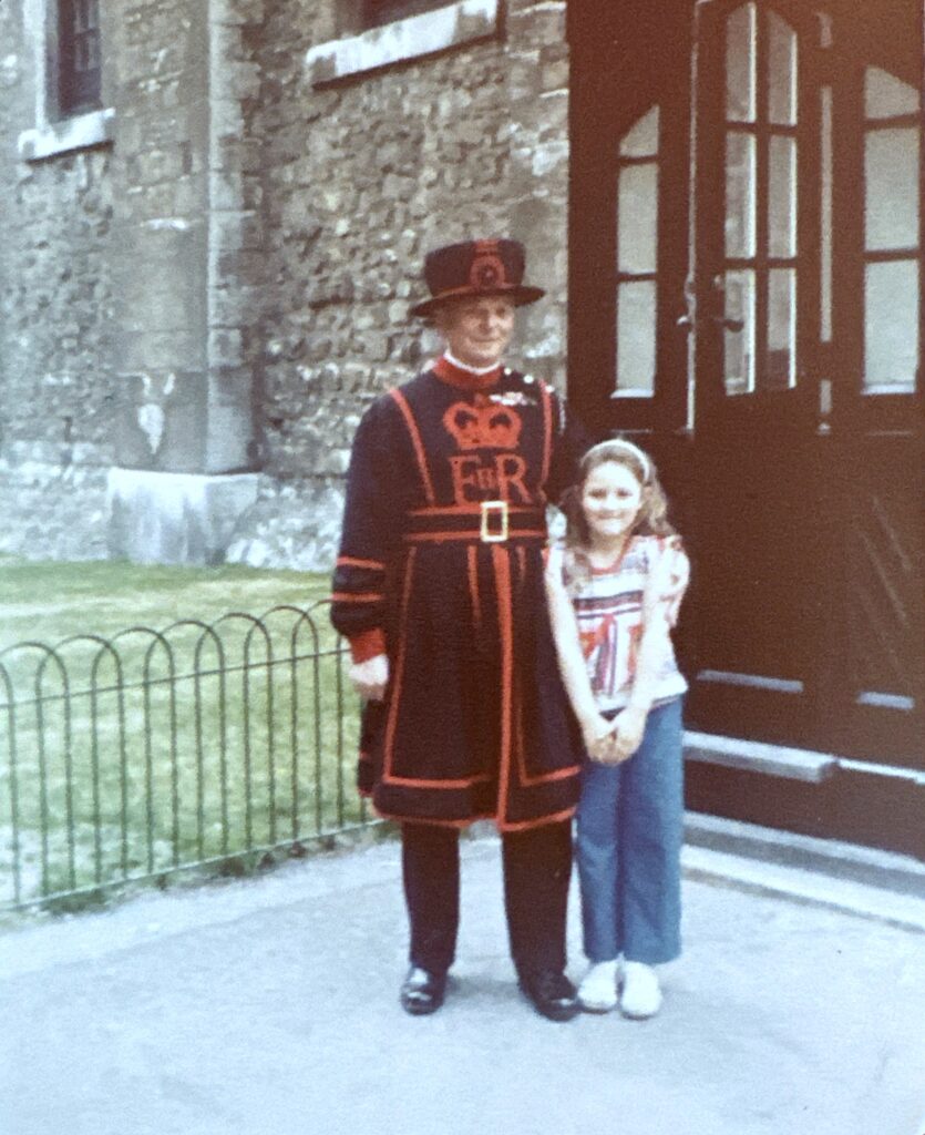 Vintage picture of young Jenny with a Tower of London Beefeater guard, London, 1980